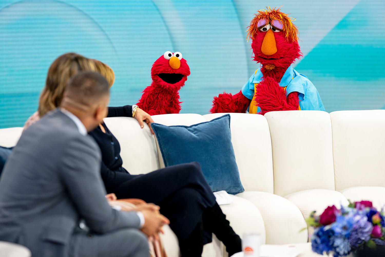 Everything we know about Louie, Elmo's multitalented, goateed dad