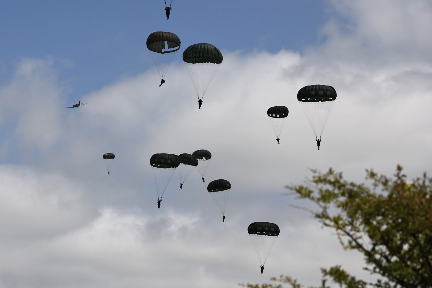 A parachute jump over Normandy kicks off D-Day 80th anniversary
