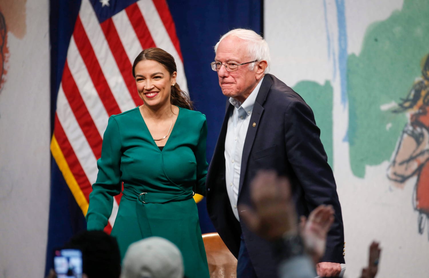 AOC and Sanders stick with Biden amid 2024 turmoil and push him on a bolder agenda