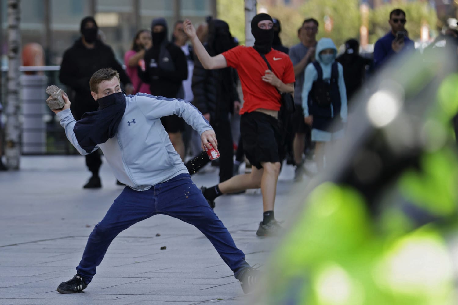 Police officers injured as far-right activists face off against anti-racism groups across U.K.