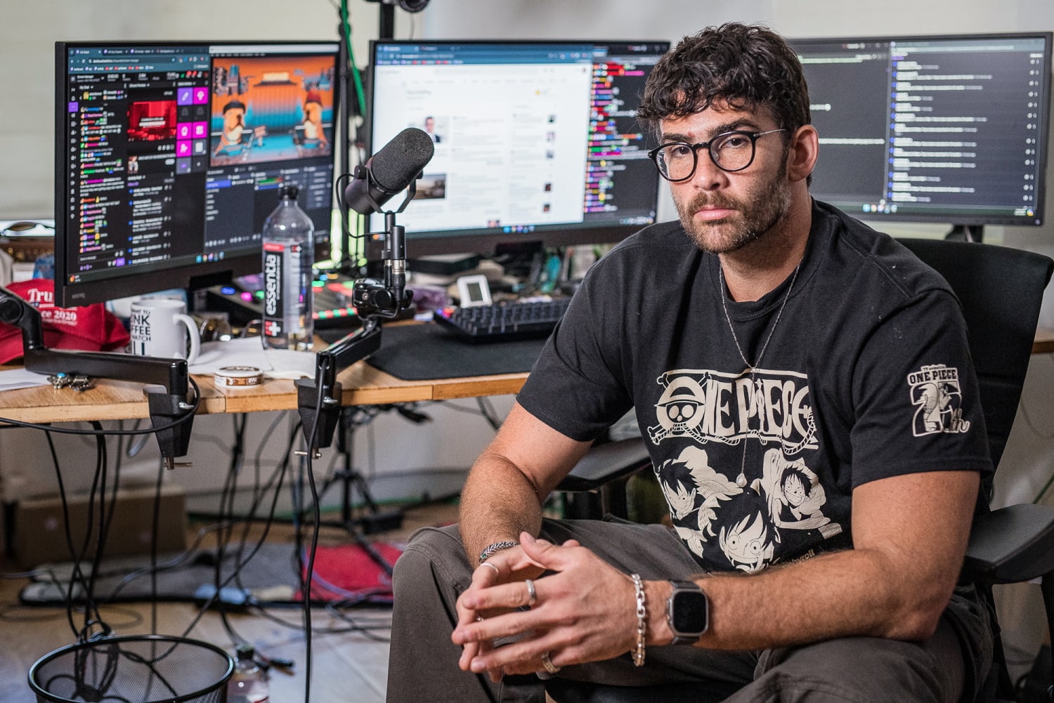 Hasan Piker political commentator streaming live on Twitch with professional setup