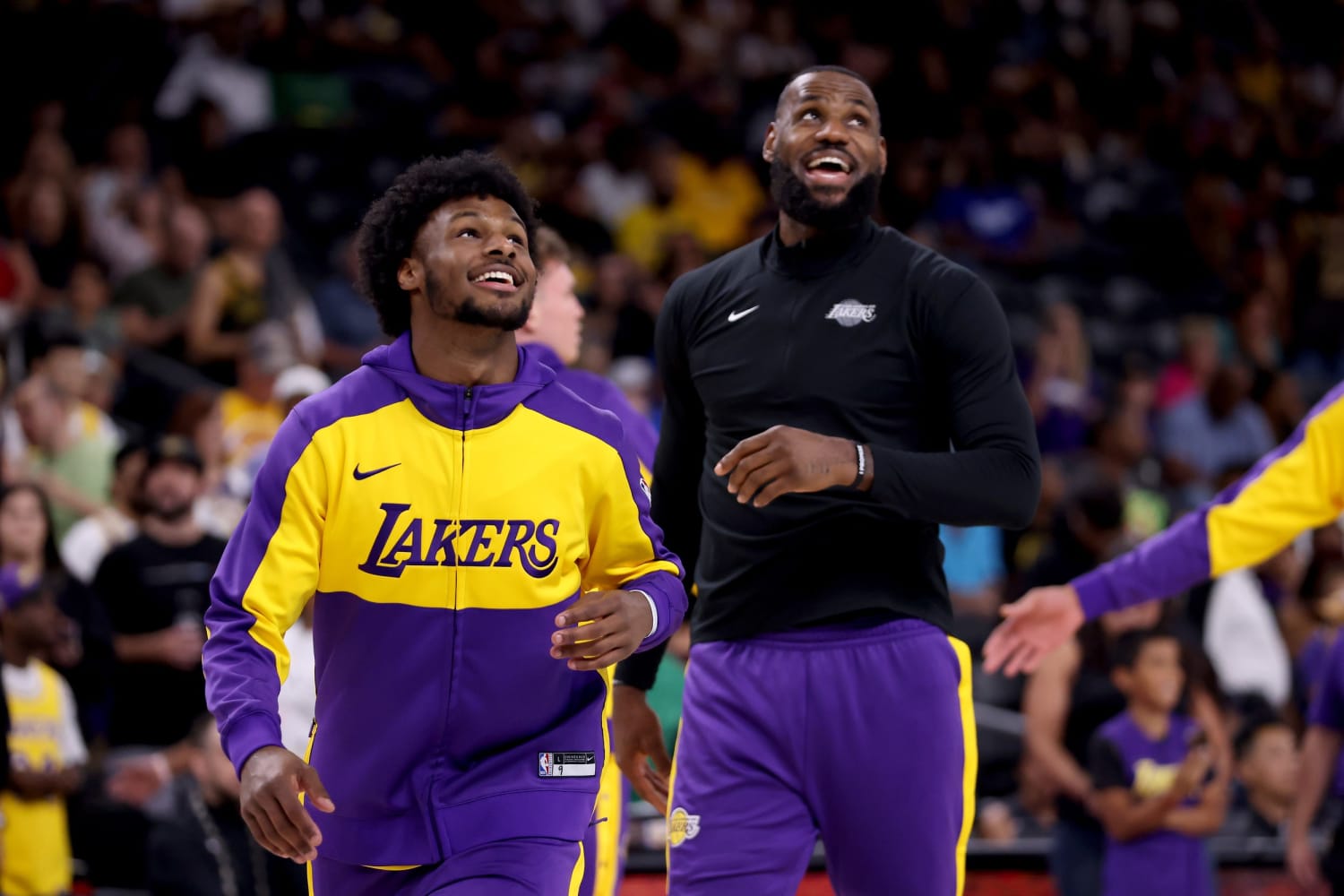 LeBron James and son Bronny play together for the first time in a preseason game