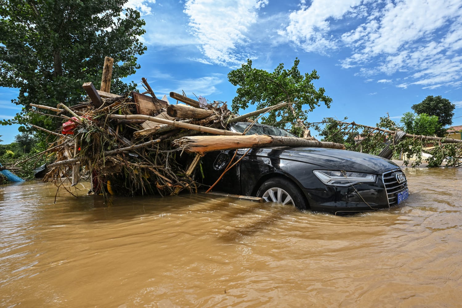 Flooding kills at least 38 as Beijing region gets almost a year's worth of rain