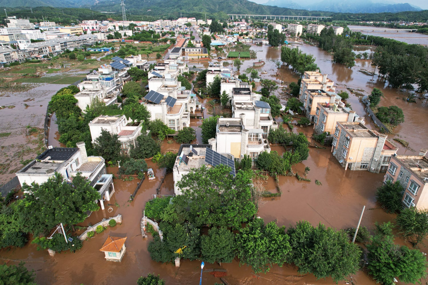 Flooding kills at least 38 as Beijing region gets almost a year's worth of rain