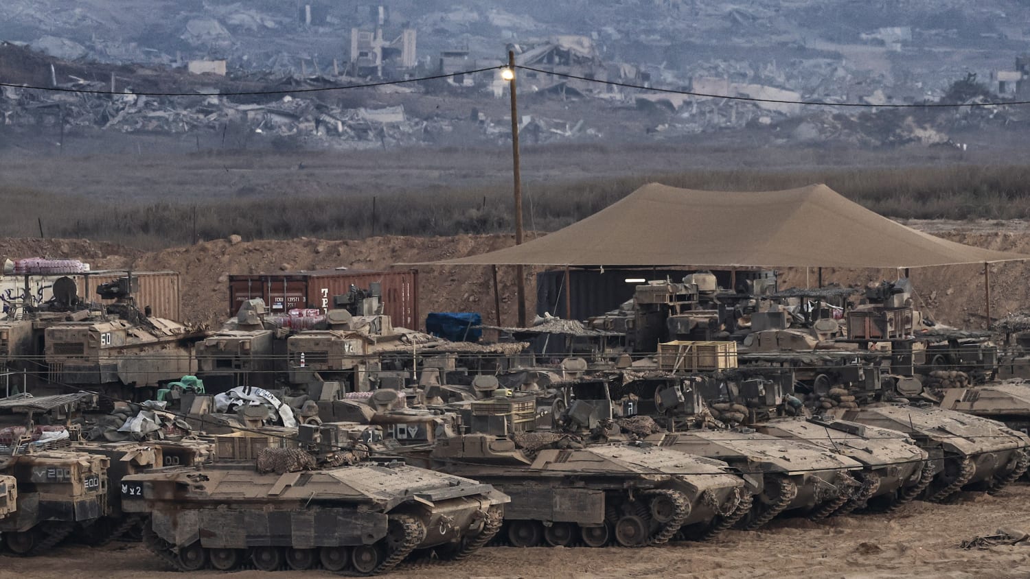 A view captured near the Gaza border, shows tank and armored vehicle movements of the Israeli army as Israel's attacks on Gaza continue without interruption, on August 10, 2025
