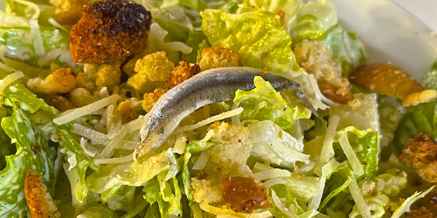 Do Whole Anchovies Belong on Caesar Salad? Viral Video Sparks Question