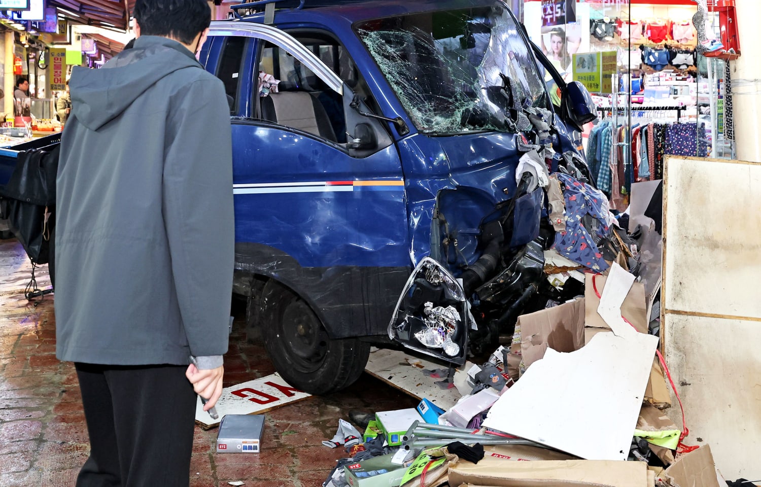 Truck hits pedestrians in South Korea market, killing 2 people and injuring 18