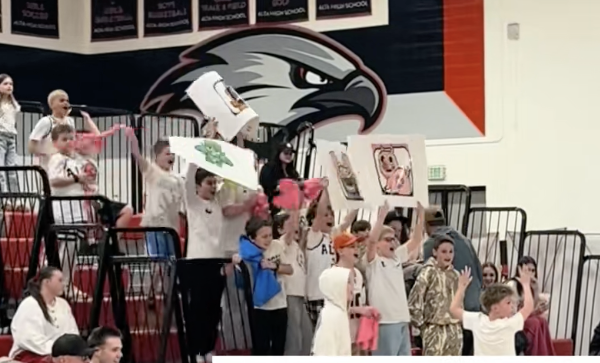 High School Basketball Team Shows up for Its 4th Grade Hype Squad in Viral Video 
