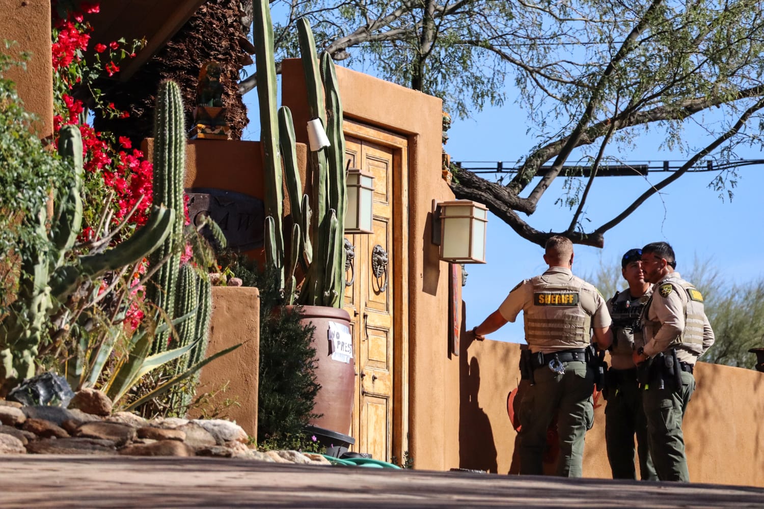 Nancy Guthrie's family visits tribute outside her home as sheriff says investigators are getting 'closer'
