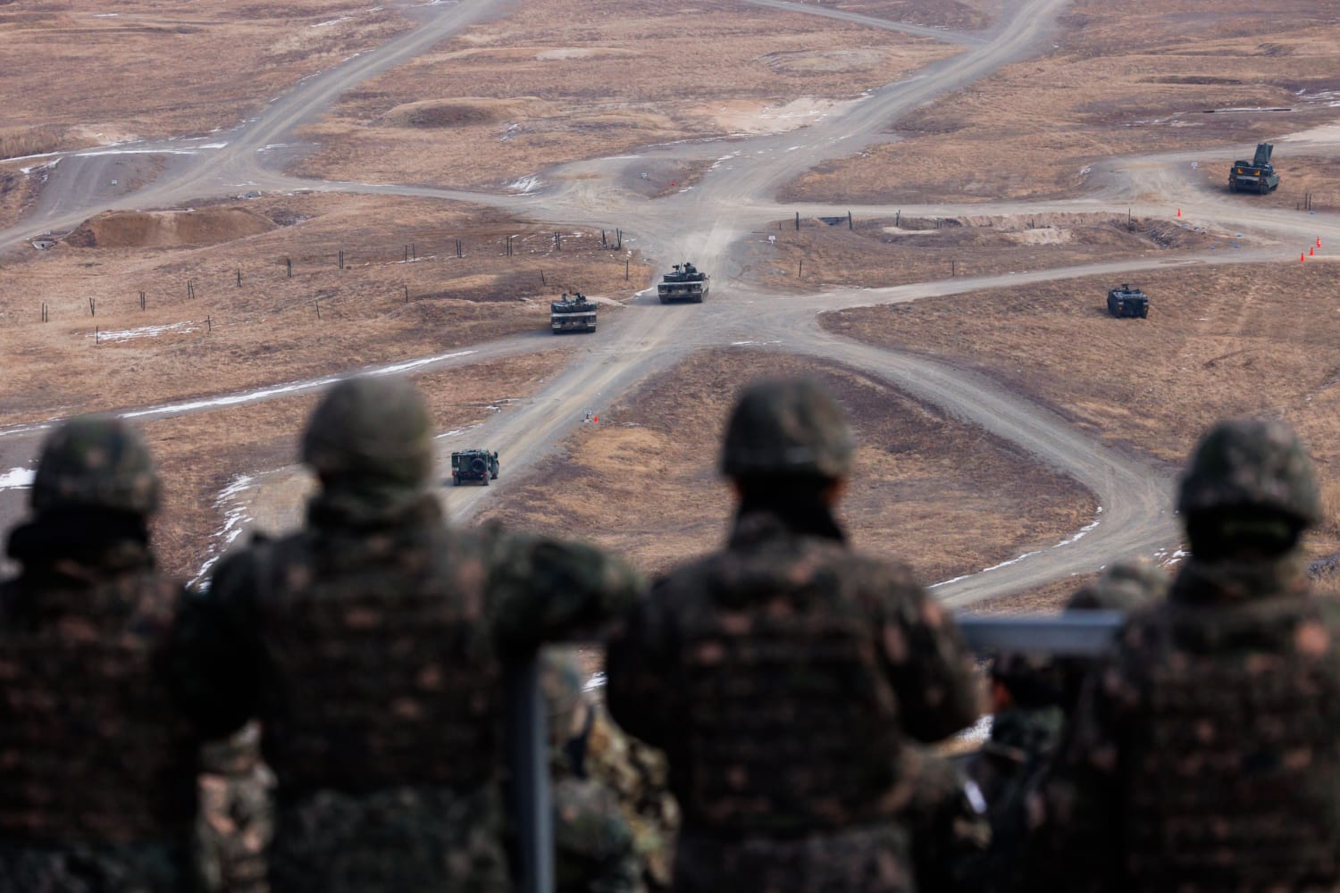 Trump Cuts Drills to Chase Kim Talks