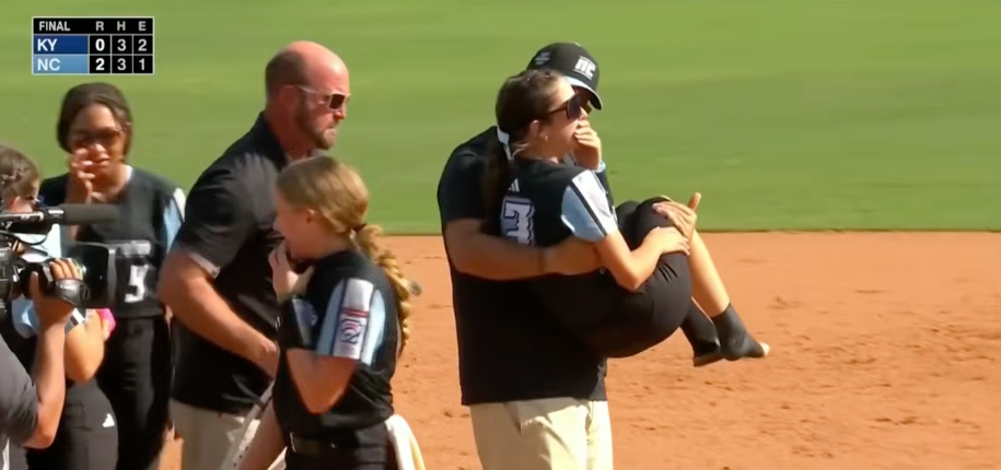 Father Who Went Viral for Carrying Injured Daughter to Celebrate Softball World Series Win Calls It ‘Dad Instincts’