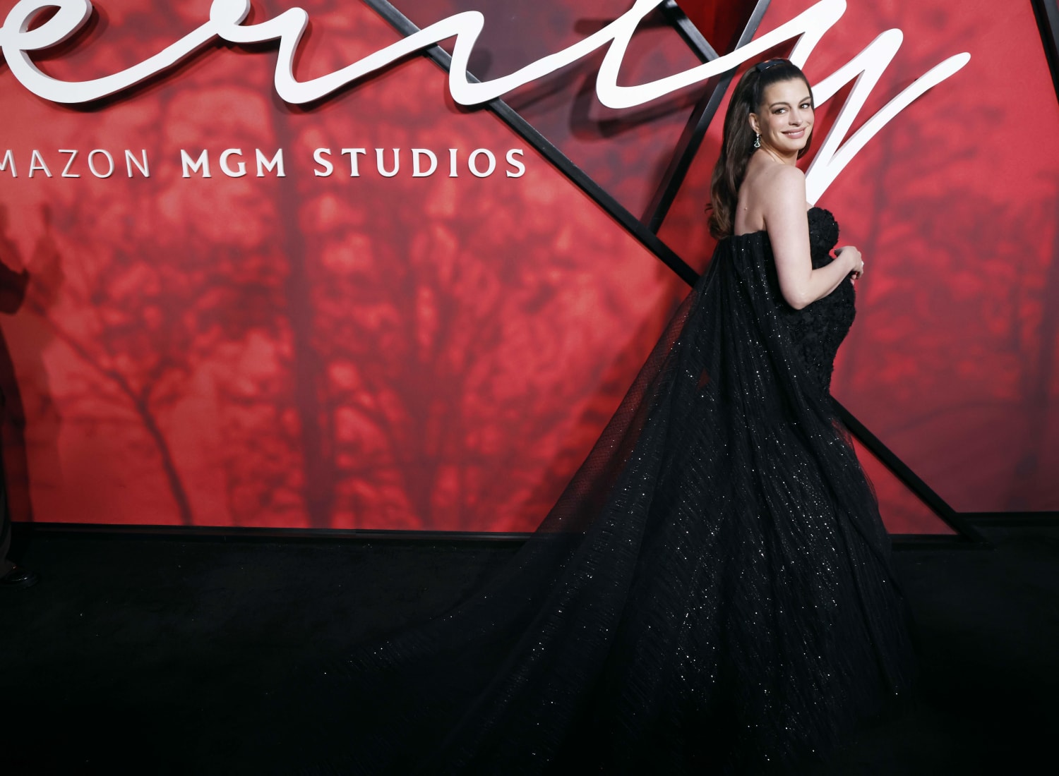 Anne Hathaway Skipped ‘Hot Ones’ Spicy Wings To Avoid Inducing Labor. Is That Even a Thing?