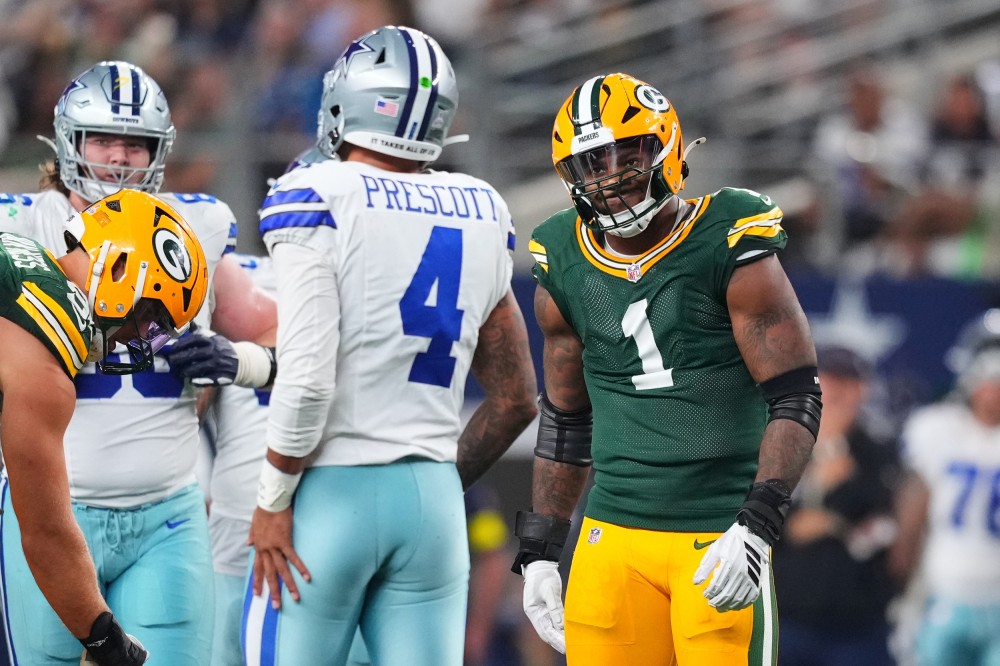 Green Bay Packers defensive end Micah Parsons looks at Dallas Cowboys' Dak Prescott on Sunday in Arlington, Texas. image source: nbcnews.com - copyright: Julio Cortez / The Associated Press