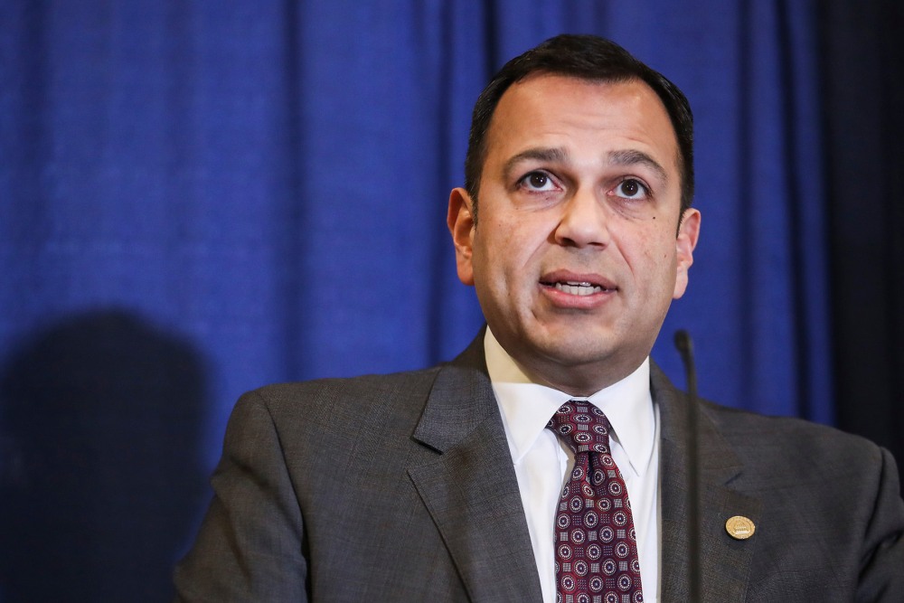 Trump-backed House candidate removes mentions of the president from his website