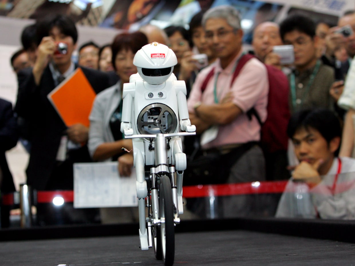Japanese robot goes bike riding