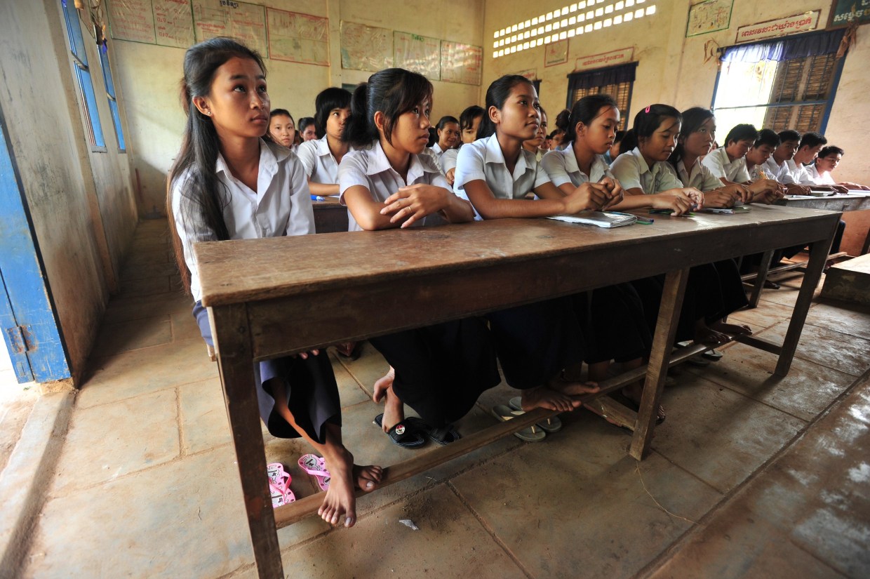 Girls study at a school in Cambodia.