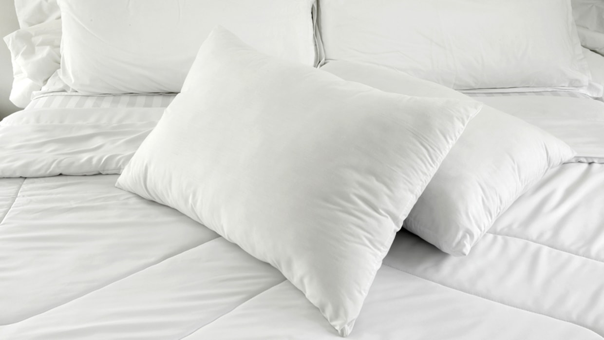 Bed of outlet pillows