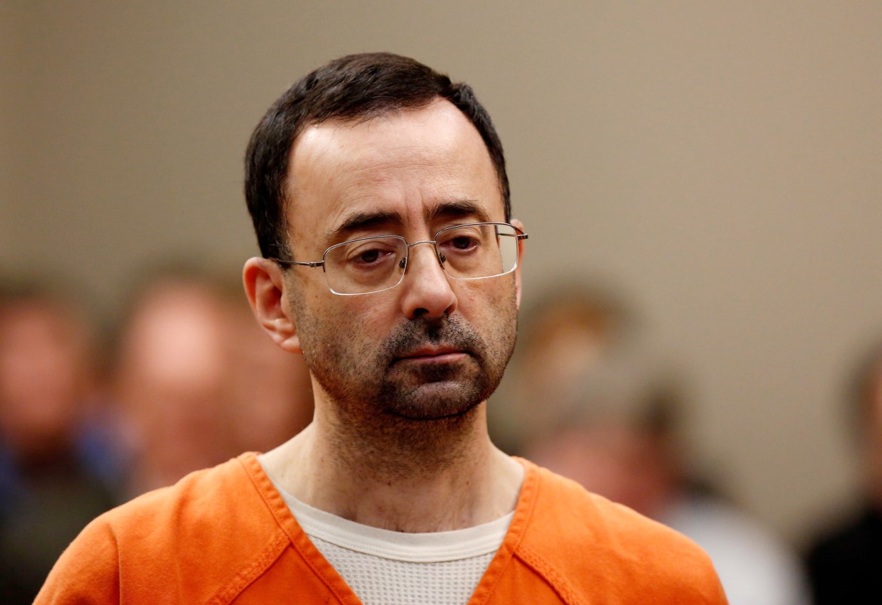 Gymnastics doctor Larry Nassar sentenced to 60 years for child porn crimes