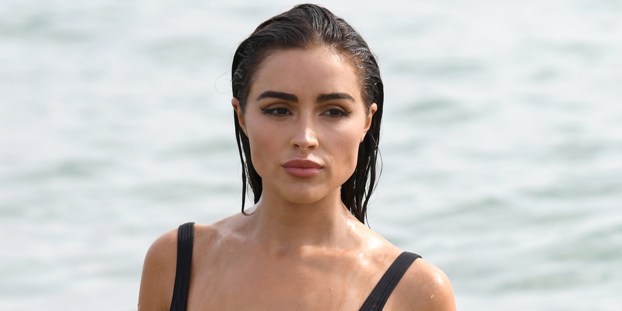 Olivia Culpo Goes Western in Lace Bralette & Boots at Evian's Club