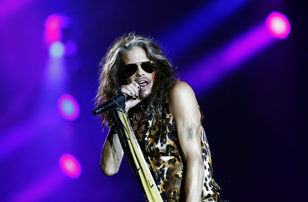 Aerosmith lead singer Steven Tyler sings 'God Bless America' during the  seventh inning stretch of the Red Sox home opener against the Detroit  Tigers at Fenway Park in Boston, Massachusetts on April