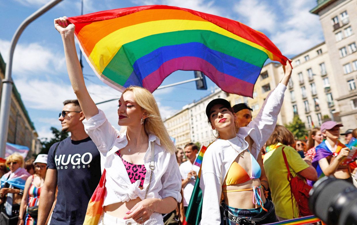 Ukraine's KyivPride teams up with Poland's Warsaw Pride to march for peace