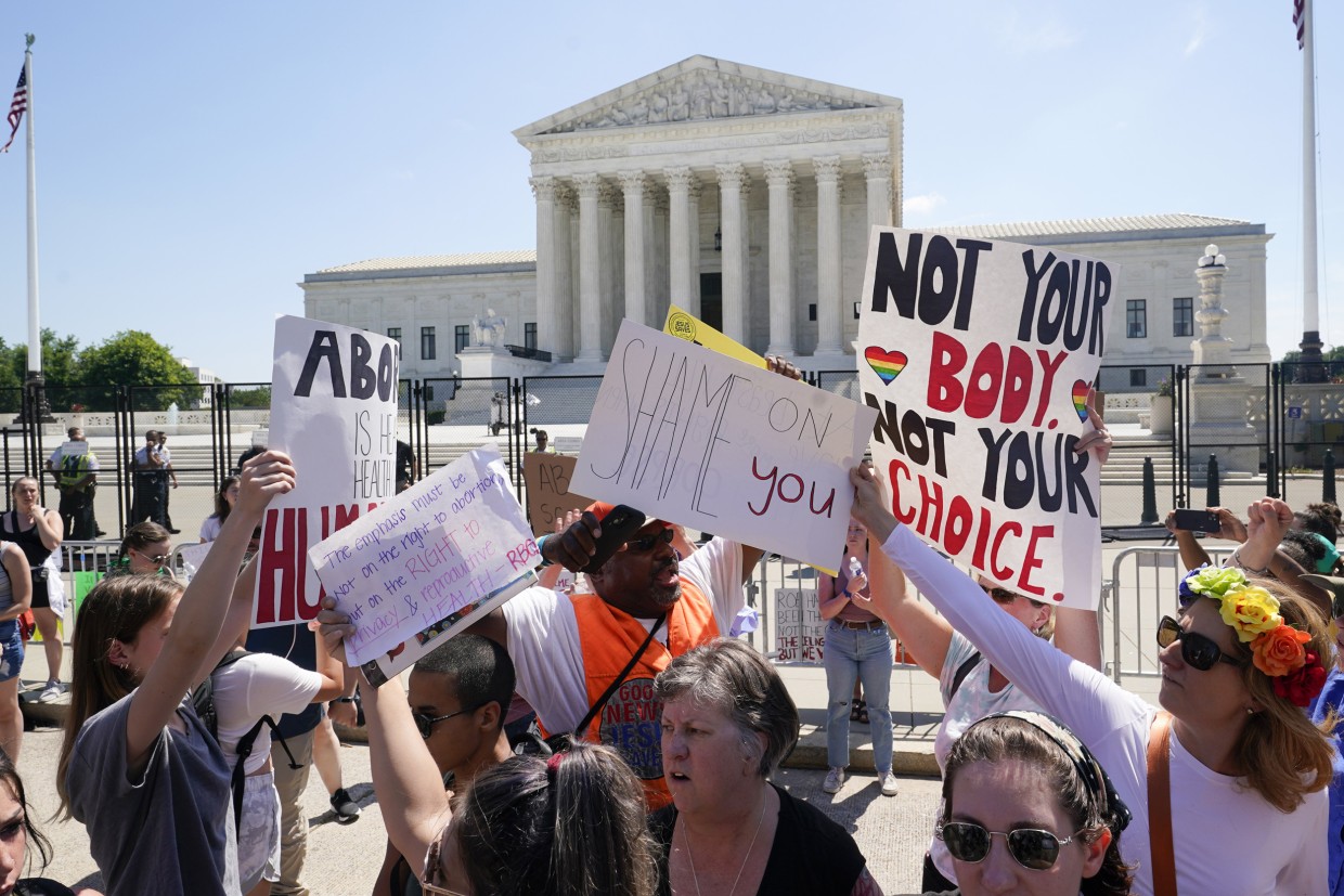 Abortion rights demonstrators protest outside the Supreme Court