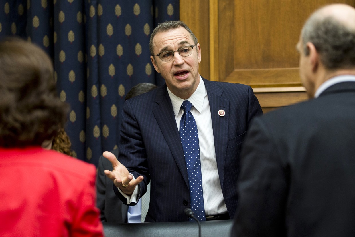 Rep. Matt Salmon, R-Ariz., center, talks with people on Capitol Hill on Feb. 28, 2013.