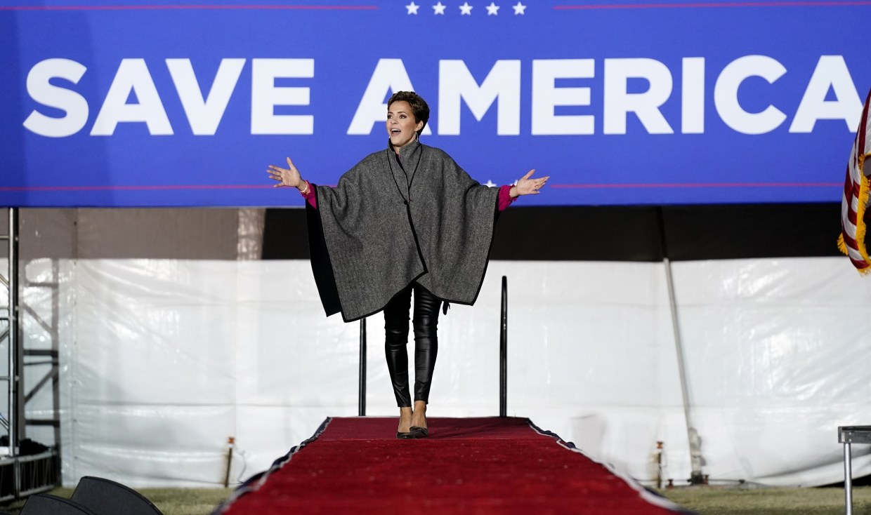 Kari Lake acknowledges the crowd at a Save America Rally prior to her speaking, on Jan. 15, 2022, in Florence, Ariz.