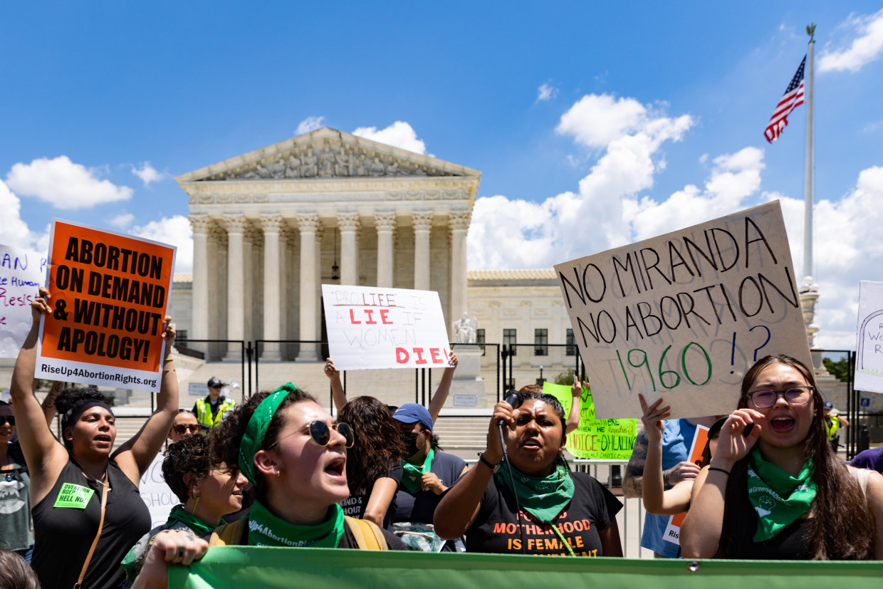 Abortion rights demonstrators protest outside the Supreme Court