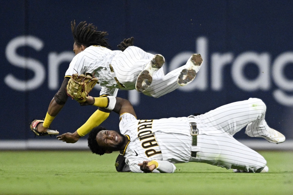 Padres' Profar collapses after collision, taken off on cart