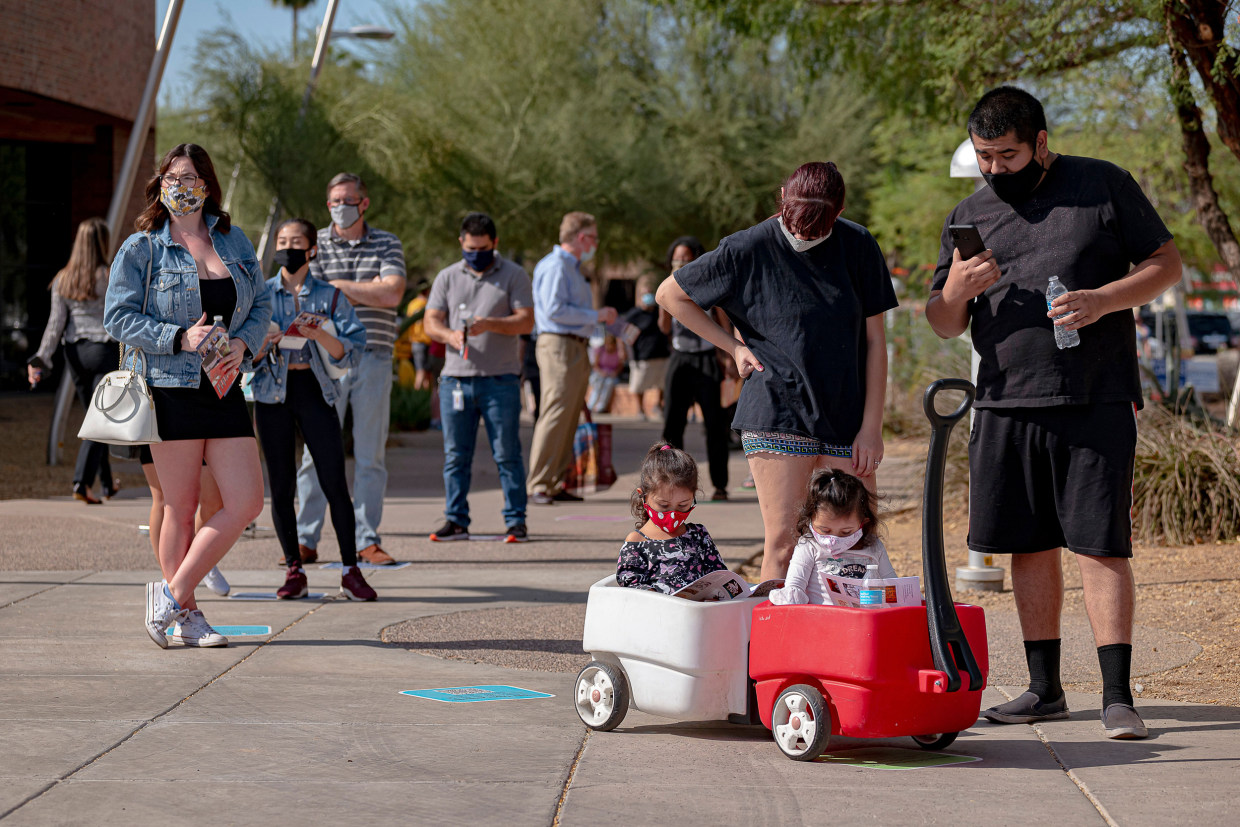 Voters wait at a polling place at Tempe History Museum in Arizona on Nov. 3, 2020.