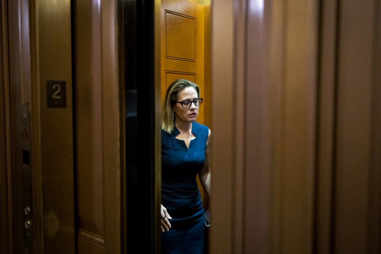 Sen. Kyrsten Sinema, D-Ariz., in an elevator outside the Senate Chamber at the Capitol on April 7, 2022, in Washington, D.C.