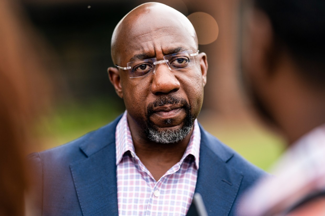 Sen. Raphael Warnock, D-Ga., at a rally in Conyers, Ga., on Aug. 18, 2022.