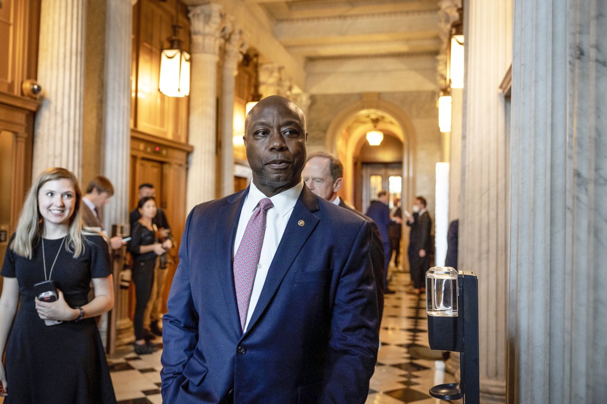 Image: Sen. Tim Scott (R-SC) walks to a policy luncheon with Senate Republicans at the U.S. Capitol building on Sept. 7, 2022.