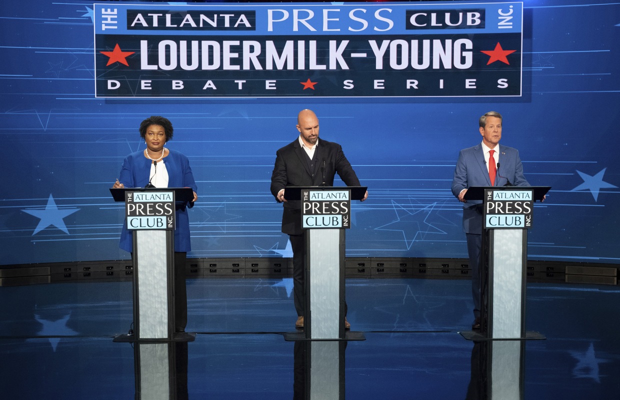 From left, Stacey Abrams, Shane Hazel and Brian Kemp debate during the Atlanta Press Club Loudermilk-Young Debate Series in Atlanta