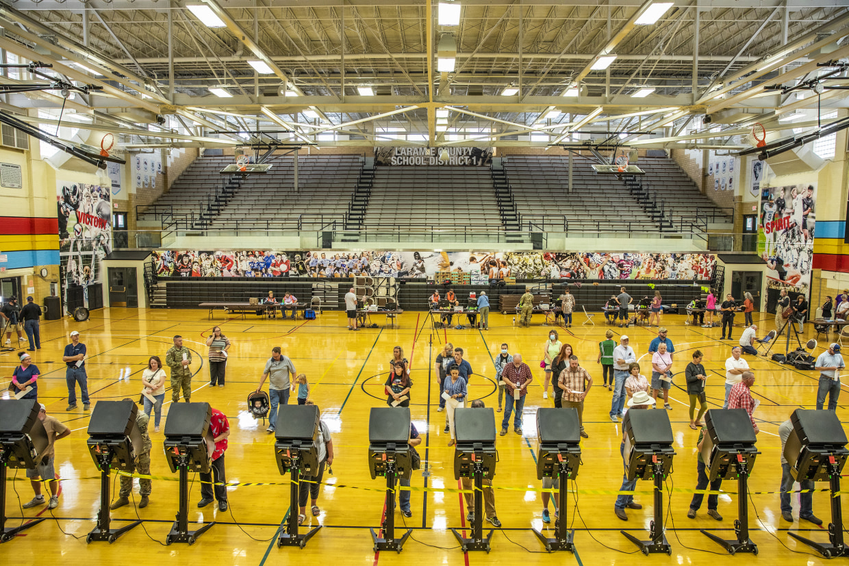 Voters cast ballots in Cheyenne, Wyo., on Aug. 16, 2022.