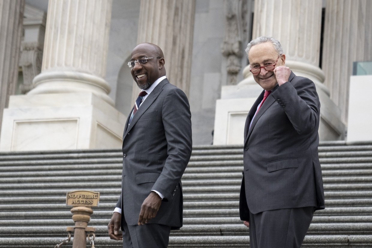 Senate Leader Schumer Greets Sen. Warnock Arriving Back To Capitol After Winning Georgia Runoff Election