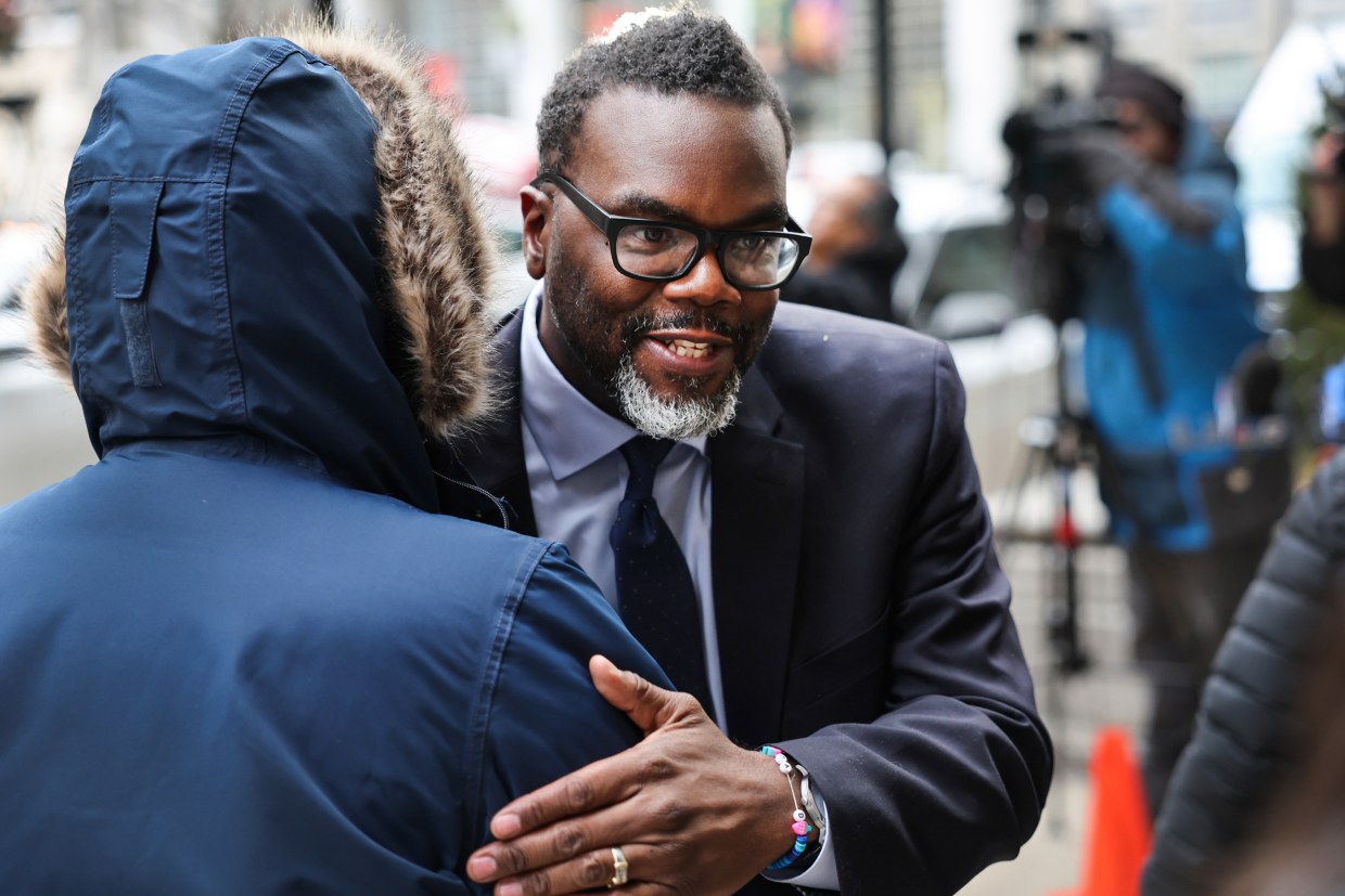 Chicago mayoral candidate and Cook County commissioner Brandon Johnson greets supporters in Chicago on Jan. 24, 2023.