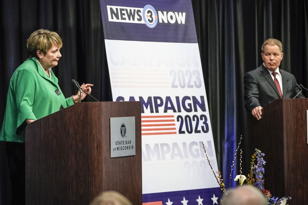 Image: Wisconsin Supreme Court candidates Republican-backed Dan Kelly and Democratic-supported Janet Protasiewicz participate in a debate on March 21, 2023, in Madison, Wis.