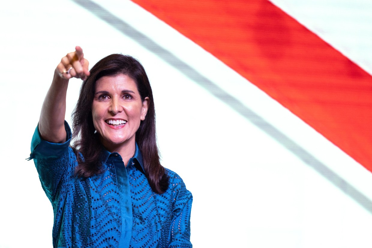 Nikki Haley points to the audience from the stage at the the Vision National Conservative Forum
