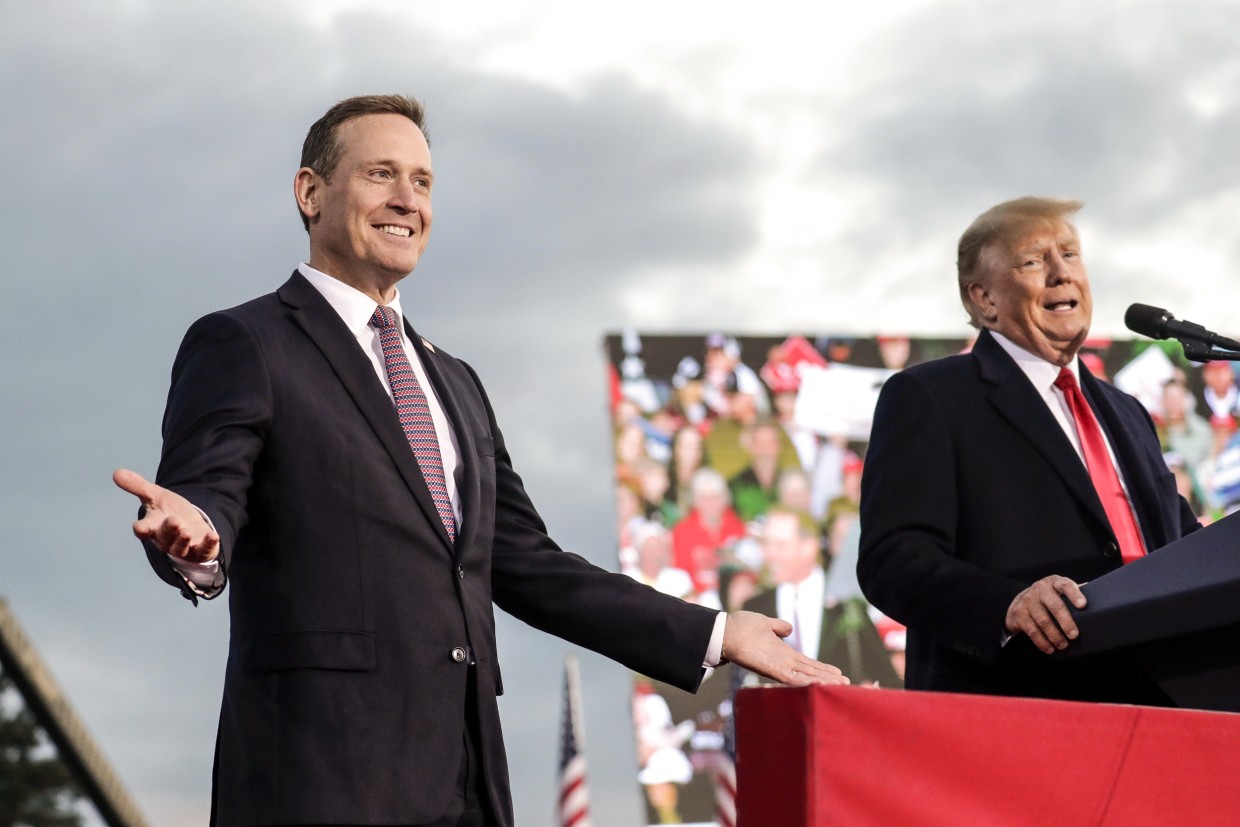 Republican candidate for Senate Ted Budd, left, of North Carolina, with former President Donald Trump during a rally on April 9, 2022, in Selma, N.C.