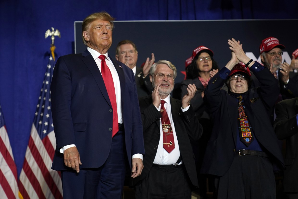 Donald Trump arrives at a campaign rally in Manchester, N.H.