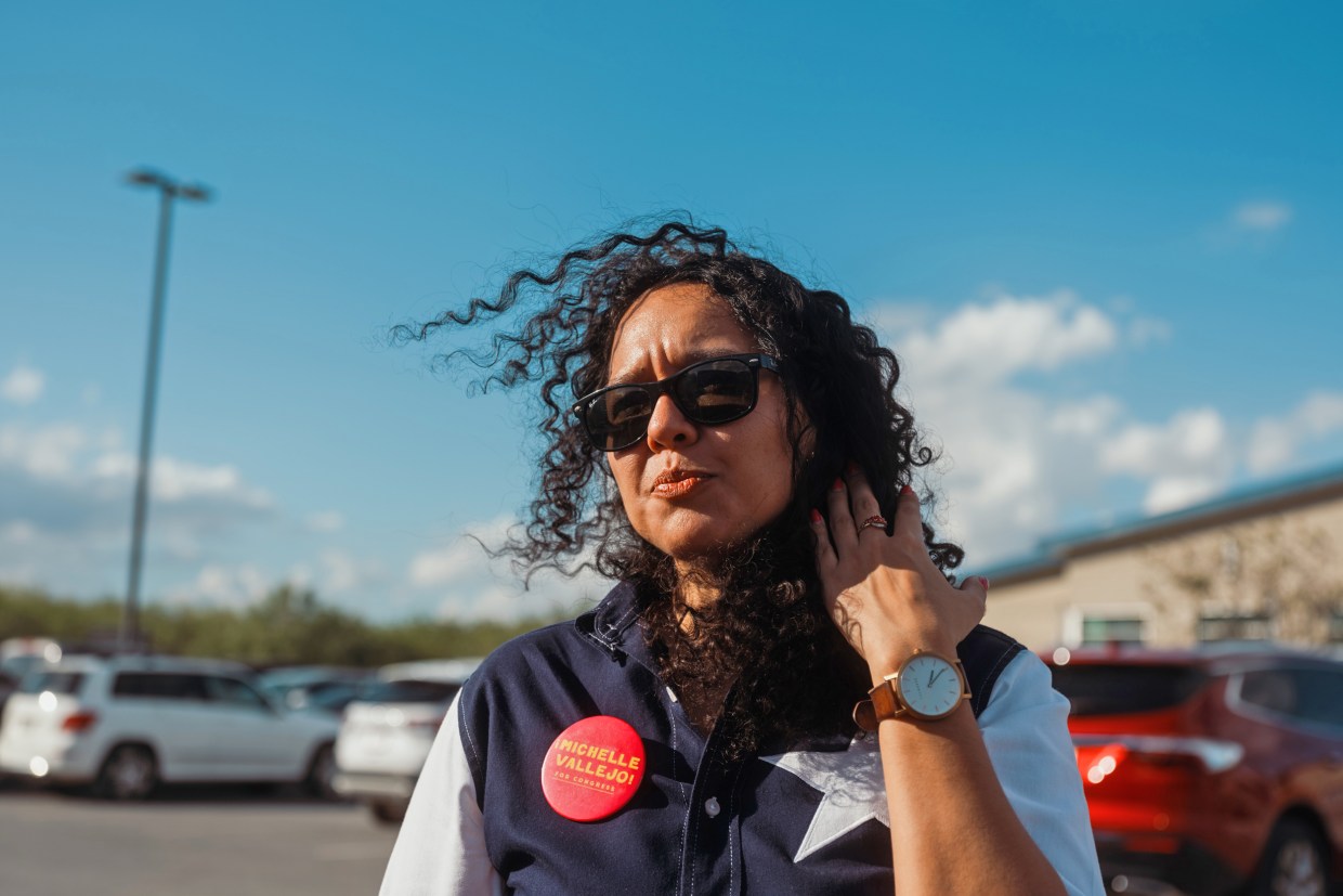 Michelle Vallejo speaks with members of the media at a polling location in Pharr, Texas, on Nov. 8, 2022.