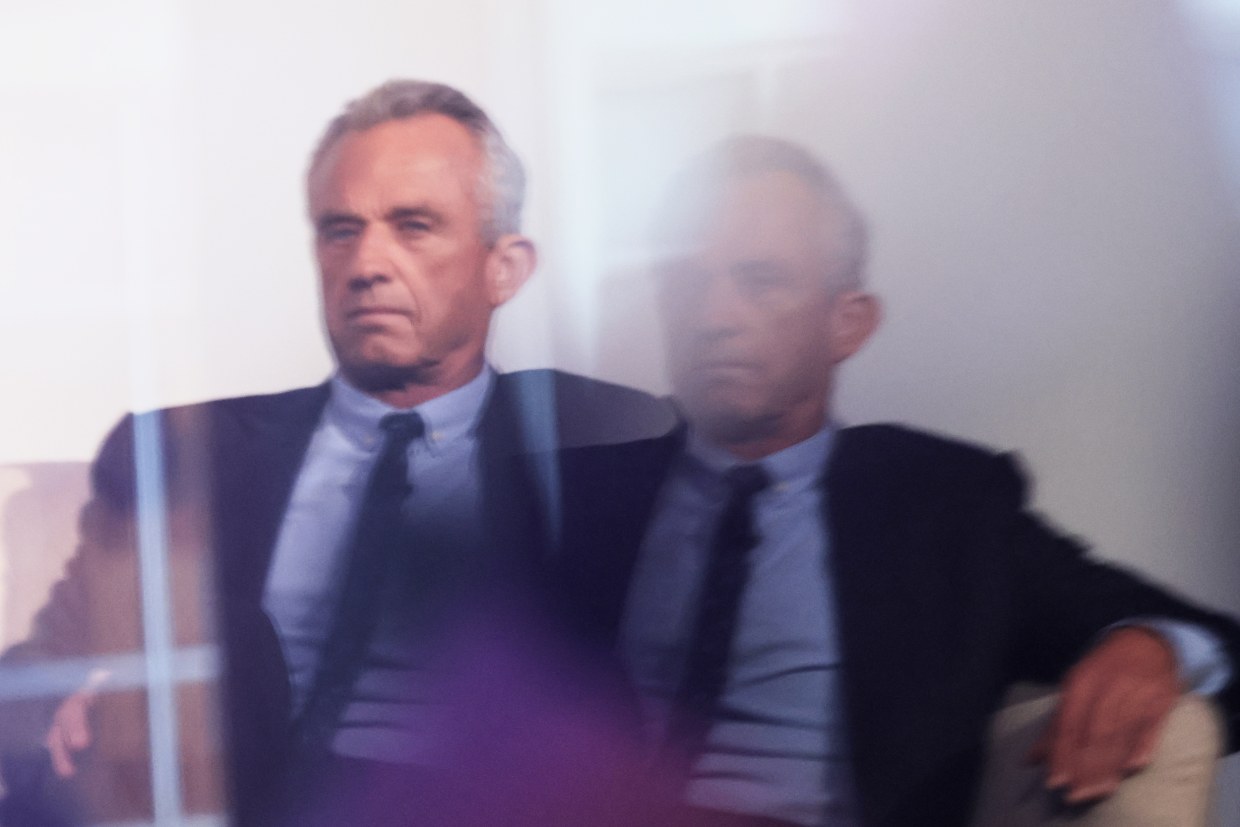 Democratic Presidential Candidate Robert F. Kennedy Jr. is seen reflected on a window during the World Values Network's Presidential candidate series in New York City, on July 25, 2023 .