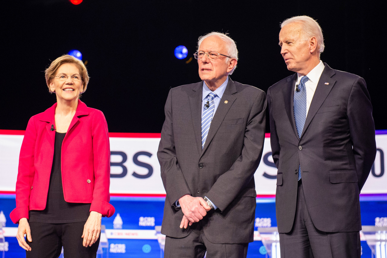 Sens. Elizabeth Warren, D-Mass., left, Bernie Sanders, I-Vt., and former Vice President Joe Biden at the Democratic presidential debate in Charleston, S.C., on Feb. 25, 2020.