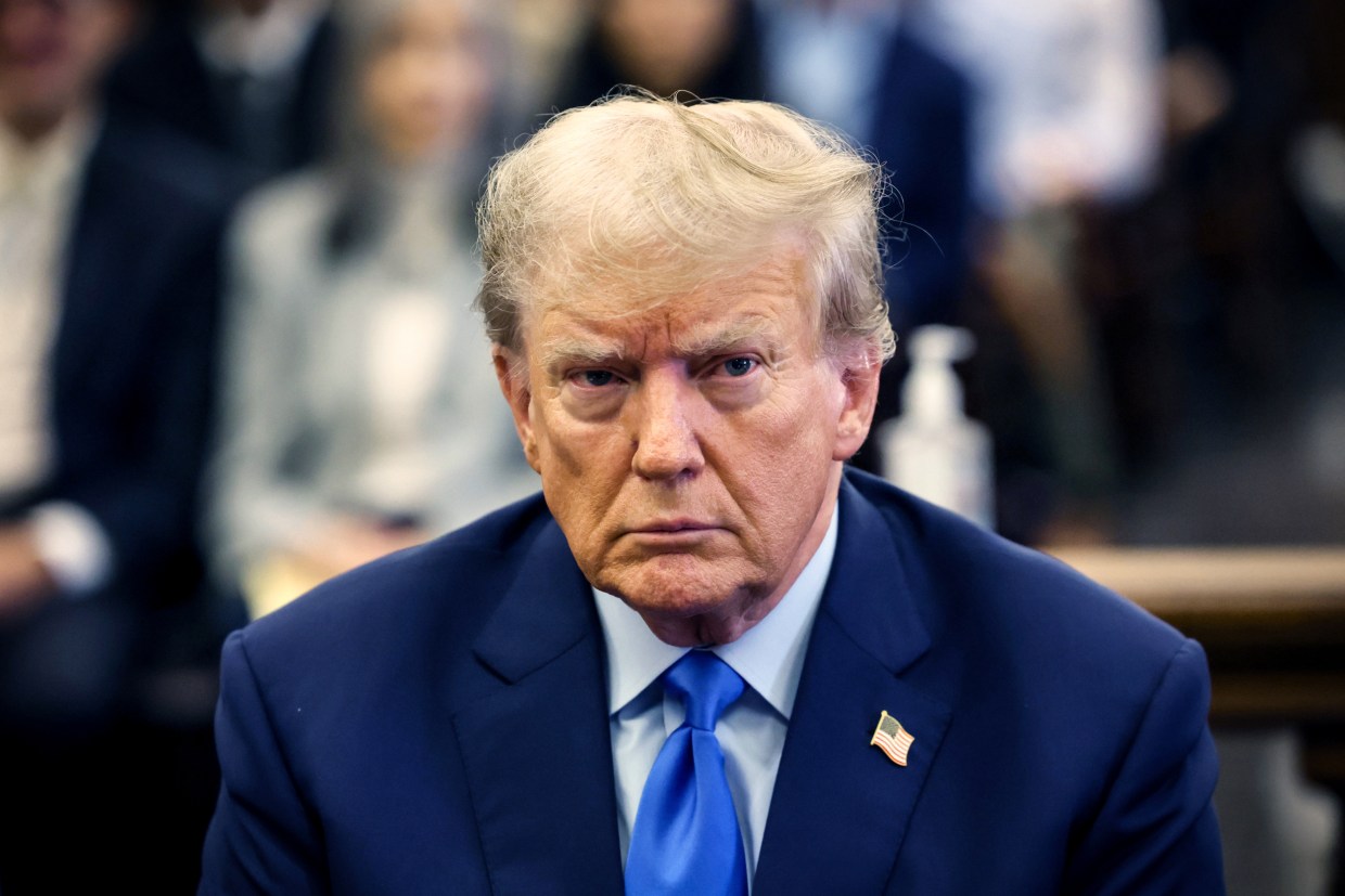 Image: Former President Donald Trump appears in the courtroom with his lawyers for the start of his civil fraud trial at New York State Supreme Court on Oct. 2, 2023 in New York.
