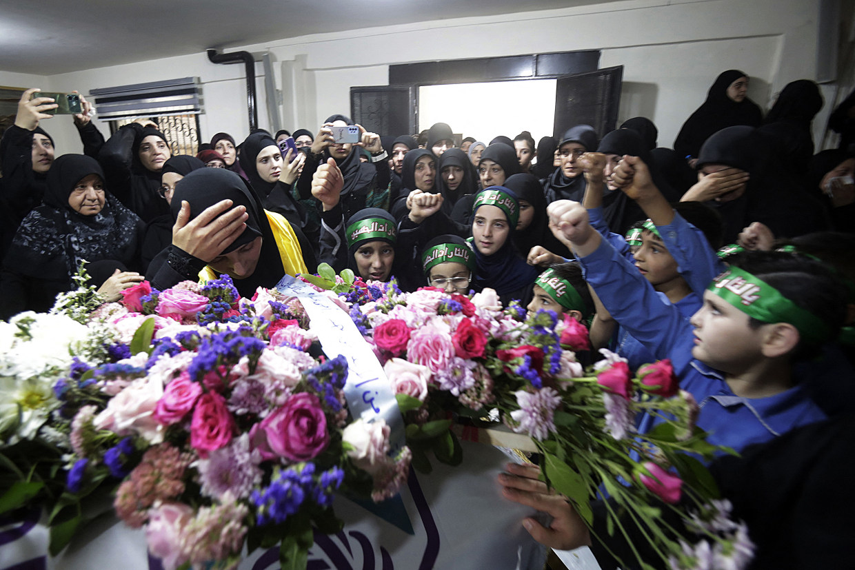 Relatives mourn 9-year-old Fatima Abdallah, who was killed after hundreds of pagers exploded in a deadly wave across Lebanon.