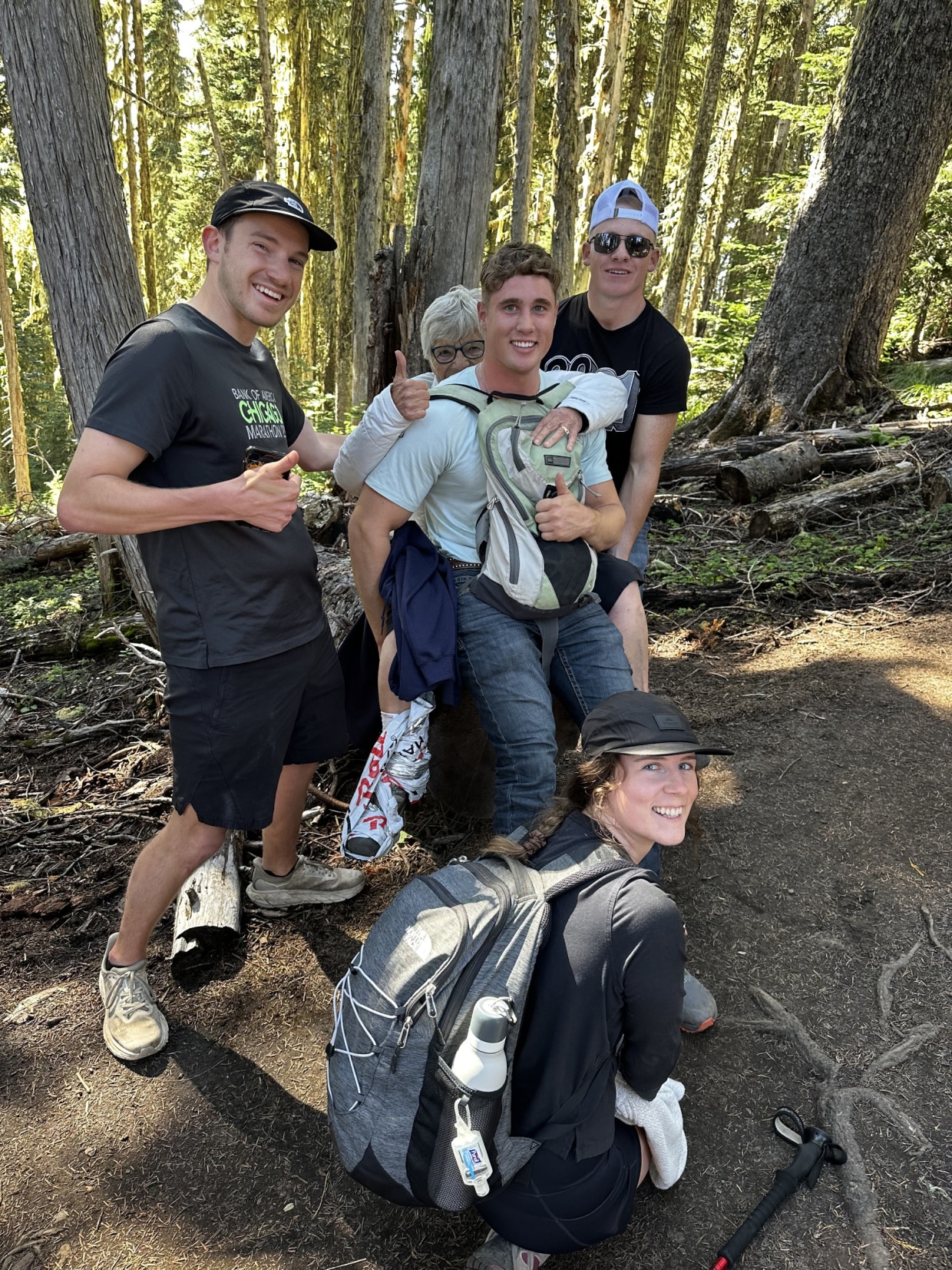 A group of hikers came together to help get an injured woman down the trail.