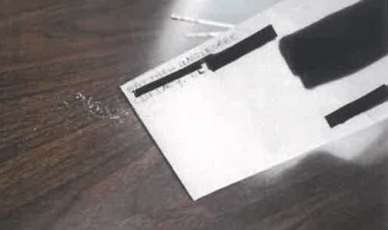 A letter received by the district office of a congressperson on Oct. 21 with a white granular substance emitting from the unopened envelope. The photo has been redacted for privacy.