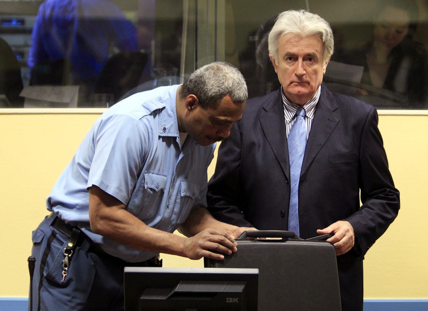 Genocide trial begins, Karadzic fails to show up